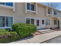 Charming townhome exterior featuring a well-manicured lawn, and inviting entrance, perfect for comfortable living at 8905 Field St # 91, Westminster, CO 80021
