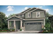 Charming two-story home featuring a covered porch and attached two-car garage at 175 Fremont Ct, Brighton, CO 80601