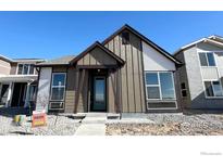 Charming home featuring modern design elements and neutral color palette at 2277 Serenidad St, Brighton, CO 80601