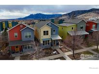 Colorful two-story homes featuring modern architecture and mountain views in a walkable neighborhood at 1434 Zamia Ave, Boulder, CO 80304