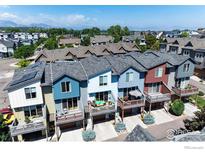 Aerial view of townhouses with mountain backdrop at 2164 E Hecla Dr # B, Louisville, CO 80027