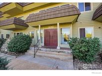 Building exterior showcasing the entrance and landscaping at 3150 Iris Ave # 303, Boulder, CO 80301