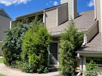 A well maintained, two-story home with neutral siding and lovely landscaping in a suburban neighborhood at 5540 Stonewall Pl # 16, Boulder, CO 80303