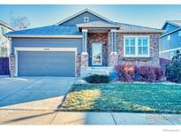 Attractive ranch-style home with a two-car garage and well-maintained landscaping at 13460 Trenton St, Thornton, CO 80602