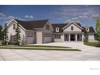 Craftsman style home with a three-car garage and large front yard at 2568 Southwind Rd, Berthoud, CO 80513