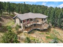 Luxury home with expansive decks and mountain views at 309 Sunrise Ln, Boulder, CO 80302