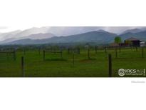 Scenic pastureland with mountain views and rustic barn at 10619 N 65Th St, Longmont, CO 80503