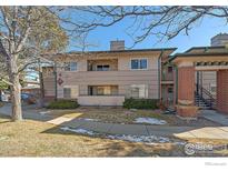 Attractive exterior of a condo building with landscaping and walkway at 770 Copper Ln # 206, Louisville, CO 80027