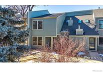 Attractive two-story townhome with a landscaped front yard at 81 Benthaven Pl, Boulder, CO 80305