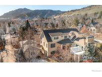 Aerial view of a charming two-story house with mountain views at 3132 5Th St, Boulder, CO 80304