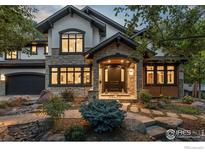 Stunning two-story home with stone accents and a landscaped front yard at 1401 Mariposa Ave, Boulder, CO 80302