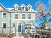 Attractive two-story home with light blue siding and a landscaped front yard at 109 Casper Dr, Lafayette, CO 80026