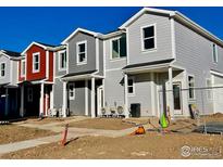 New townhome community with multiple units, featuring gray and red exteriors at 2150 Violet Ave, Boulder, CO 80304