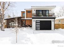 Modern two-story home with wood and stucco siding, snowy landscape at 3560 16Th St, Boulder, CO 80304