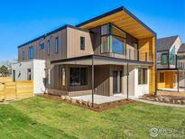 Modern two-story home with metal siding and a covered patio at 2125 Vine Ave, Boulder, CO 80304