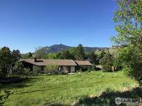 Ranch style home with mountain views and spacious backyard at 710 Linden Park Dr, Boulder, CO 80304