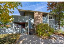 Attractive two-story condo building with brick accents and private decks at 1111 Elysian Field Dr # D, Lafayette, CO 80026