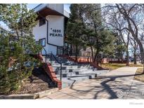 Front view of a building with stairs and landscaping at 1934 18Th St # 12, Boulder, CO 80302