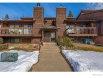 Attractive exterior of a brown multi-unit building with snow on the ground at 2640 Juniper Ave # 2, Boulder, CO 80304