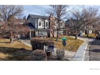 Townhouse exterior, nicely landscaped, with mountain views in the background at 4101 W 111Th Cir, Westminster, CO 80031