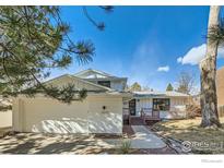 Charming home with a well-maintained front yard and a two-car garage at 4667 Harwich St, Boulder, CO 80301