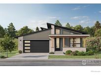Modern home featuring a stylish garage door, brick accents, and sleek architectural design at 2286 Star Hill St, Longmont, CO 80503