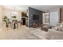 A modern, virtually staged living room featuring an open floor plan and a view of the kitchen at 3009 Madison Ave # 317, Boulder, CO 80303