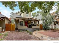 Charming home featuring a welcoming front porch, well-maintained yard, and inviting curb appeal at 3440 W 33Rd Ave, Denver, CO 80211