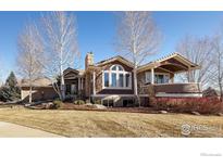 Beautiful home with attractive landscaping, stone accents, and charming curb appeal at 3805 Glenn Eyre Dr, Longmont, CO 80503