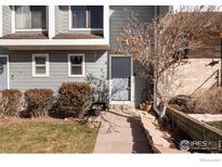 Charming front entrance featuring well-maintained landscaping at 8773 W Cornell Ave # 4, Lakewood, CO 80227