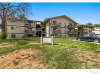 Attractive condo building featuring well-maintained landscaping and private balconies at 625 Manhattan Pl # 308, Boulder, CO 80303