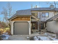 Charming townhome with a one-car garage and inviting front entry, lovely architectural detail and nice landscaping at 4647 Dapple Ln, Boulder, CO 80301