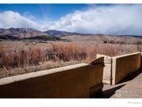 Scenic view of land and distant mountains from the grounds at 8602 N 39Th St, Longmont, CO 80503