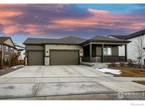 Charming single-Gathering home featuring a two-car garage and inviting front porch at 744 S 10Th St, Berthoud, CO 80513