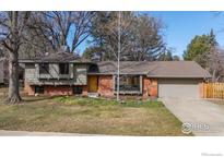 Charming single-Gathering home with well-maintained lawn and mature trees, offering curb appeal and a welcoming atmosphere at 255 Kiowa Pl, Boulder, CO 80303