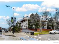 Attractive condo complex with well-maintained landscaping and inviting entrance and clearly visible address at 1800 Pearl St # 3, Boulder, CO 80302
