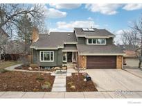 Charming two-story home with lush landscaping and a spacious two-car garage at 2167 Jordan Pl, Boulder, CO 80304