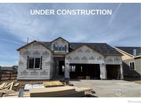 Under construction single Gathering home showing the architectural design and garage at 16843 Ballinger Cir, Mead, CO 80542