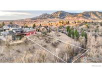 View of the property lot, surrounded by beautiful landscape and mountain views at 2003 Balsam Dr, Boulder, CO 80304