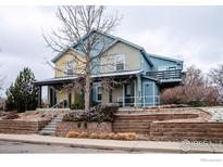 Inviting two-story townhome with a covered porch and well-maintained landscaping in a desirable neighborhood at 3671 Pinedale St # G, Boulder, CO 80301