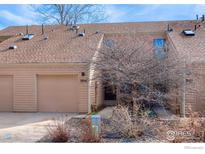 Inviting townhome featuring a one-car garage and a covered front entry at 3076 Fulton Cir, Boulder, CO 80301