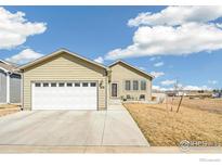 Charming single-Gathering home with a well-manicured lawn and a two-car attached garage at 7891 St Vrain Dr, Frederick, CO 80530