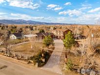 Beautiful aerial view of home showing the surrounding landscape and mountain views at 4963 Kelso Rd, Boulder, CO 80301