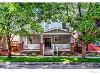 Charming two-story home with a welcoming front porch and well-maintained landscaping at 4351 W 118Th Way, Westminster, CO 80031