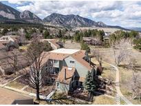 Inviting exterior of a two-story home with a backdrop of scenic mountain views at 3187 Redstone Ln # G, Boulder, CO 80305