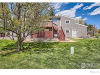 Charming exterior view showcasing a well-maintained lawn and a lovely two-story home with wood accents at 3790 Iris Ave # B, Boulder, CO 80301