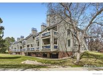 Inviting townhouse featuring a covered deck and well-maintained landscaping at 3260 47Th St # 108A, Boulder, CO 80301