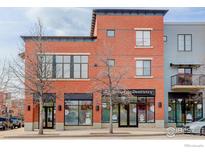 A captivating multi-story commercial building boasts eye-catching architectural details and a prime location at 1200 Yarmouth Ave # 239, Boulder, CO 80304