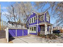 Unique two-story home featuring a charming front porch and matching shed for extra storage at 2276 Goss Cir, Boulder, CO 80302