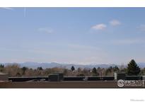 Breathtaking mountain views showcased from the rooftop, offering a serene backdrop at 2660 E Otero Pl # 7, Centennial, CO 80122